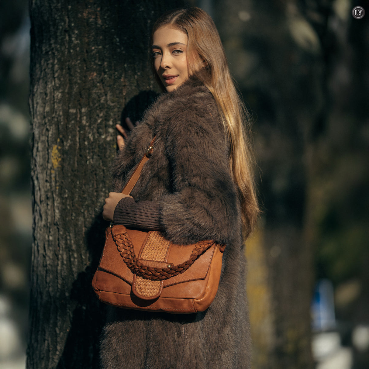 Borsetta Antea in pelle intrecciata