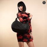 Borsa Iris Maxi in pelle intrecciata